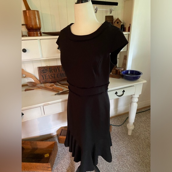 DKNY - Picture 1 of 3